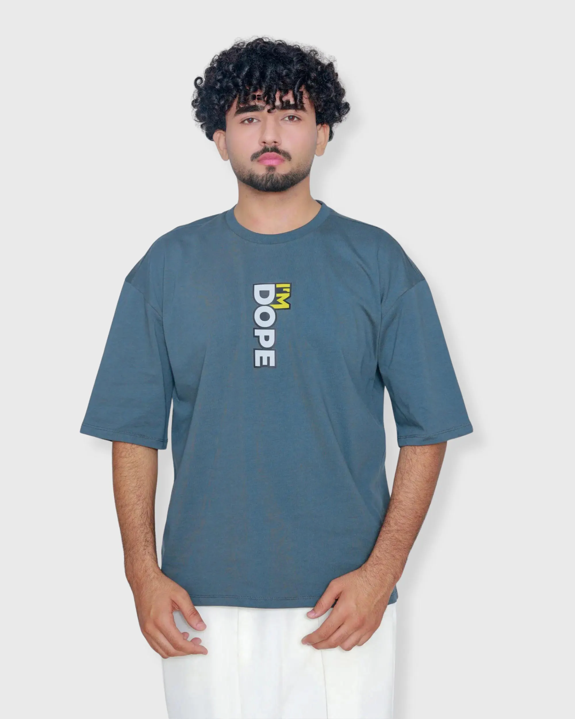 Deep teal oversized box fit t-shirt with vertical “I’m Dope” front print on center chest