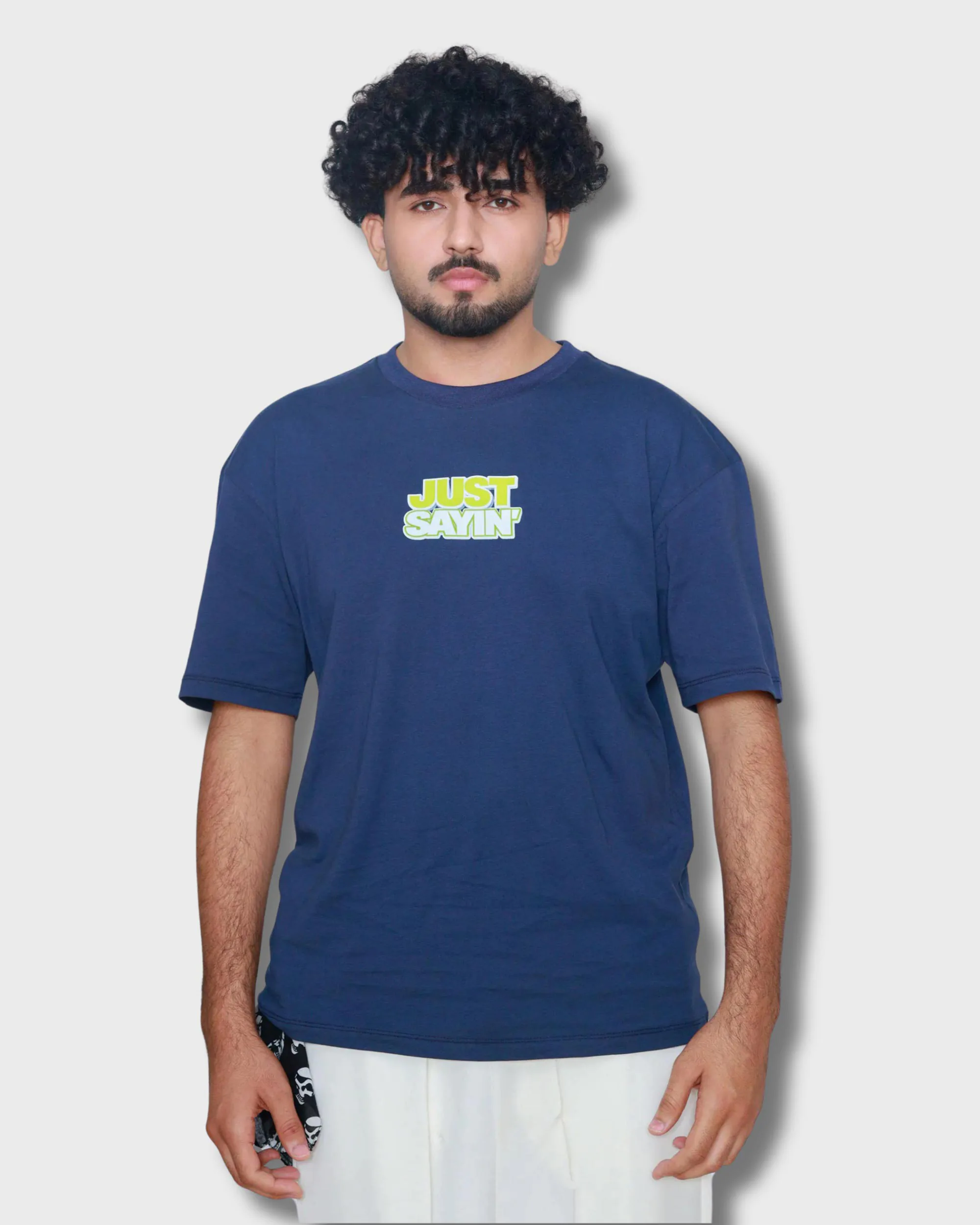 Navy blue oversized box fit t-shirt with “Just Sayin’” graphic print on center chest