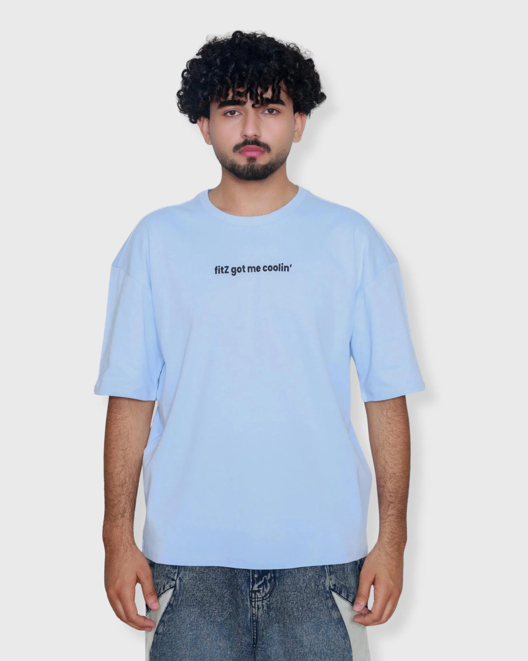 Sky blue oversized box fit t-shirt with “fitz got me coolin’” text print on center chest