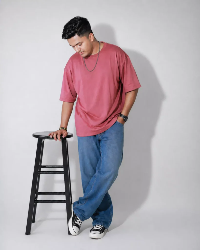Rose pink oversized box fit t-shirt with drop shoulder styled in editorial setup