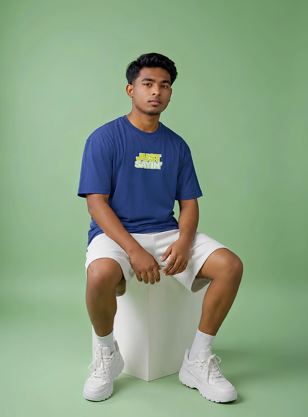 Navy blue oversized box fit t-shirt with drop shoulder styled with casual shorts