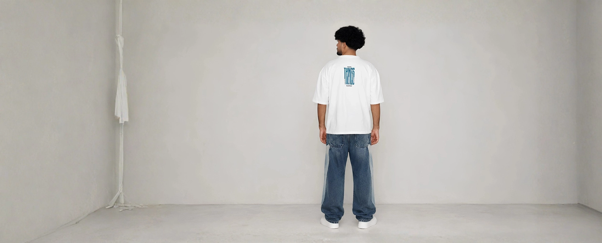 White oversized box fit t-shirt with vertical graphic print on center back